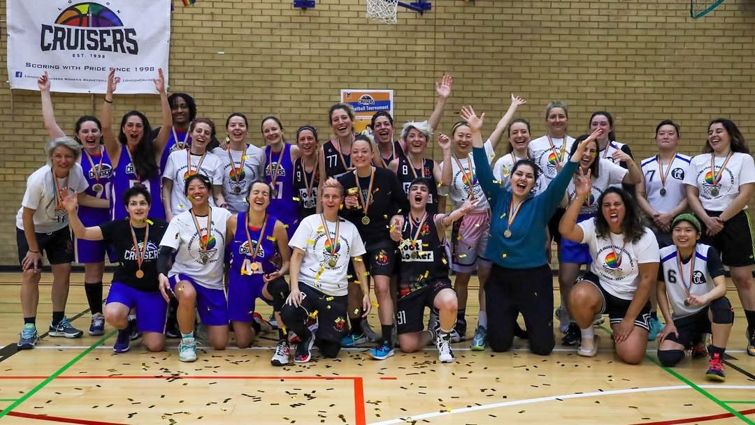 3 basketball teams celebrate being the winners of the 2024 tournament on basketball court, with confetti on the floor